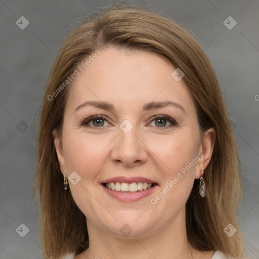 Joyful white adult female with medium  brown hair and grey eyes