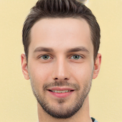 Joyful white young-adult male with short  brown hair and brown eyes