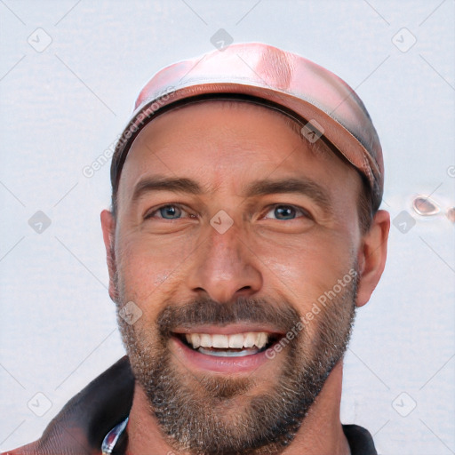 Joyful white young-adult male with short  brown hair and blue eyes