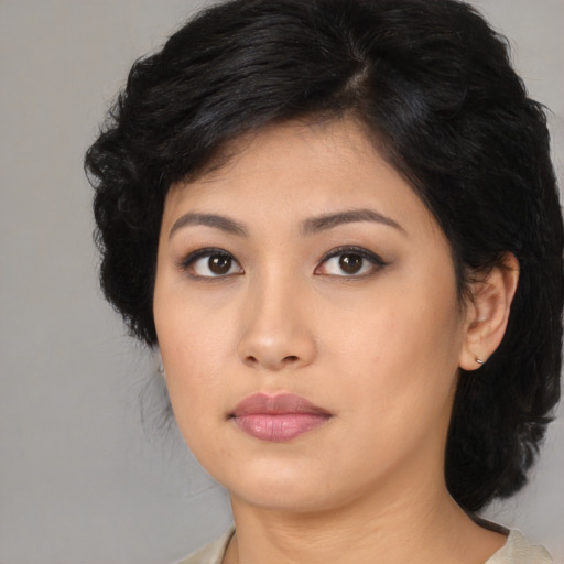Neutral asian young-adult female with medium  black hair and brown eyes