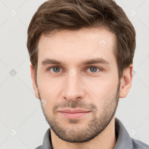 Neutral white young-adult male with short  brown hair and grey eyes