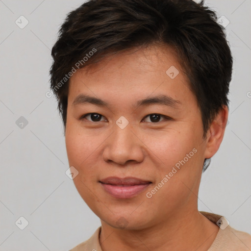 Joyful asian young-adult female with short  brown hair and brown eyes