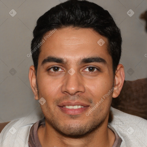Joyful white young-adult male with short  black hair and brown eyes