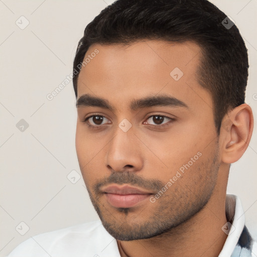 Neutral white young-adult male with short  black hair and brown eyes