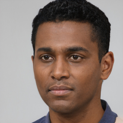 Neutral black young-adult male with short  black hair and brown eyes