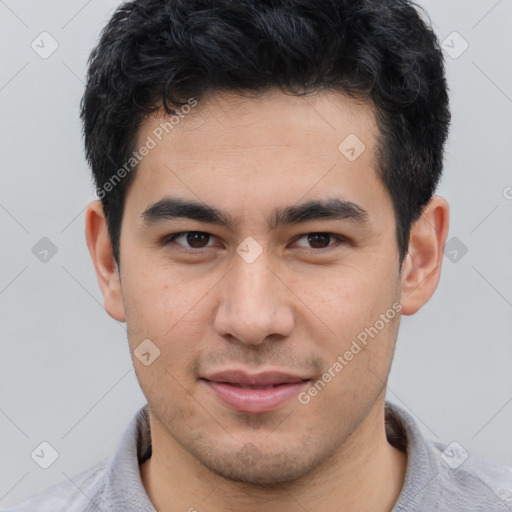 Joyful latino young-adult male with short  brown hair and brown eyes