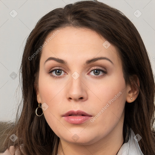 Neutral white young-adult female with long  brown hair and brown eyes