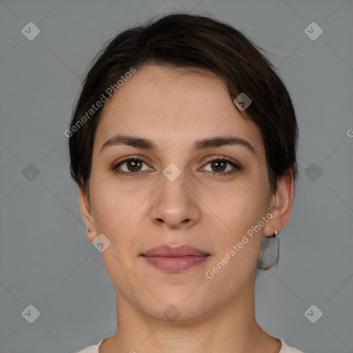 Joyful white young-adult female with short  brown hair and brown eyes