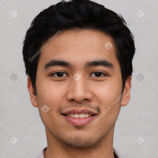 Joyful asian young-adult male with short  black hair and brown eyes