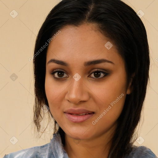 Joyful latino young-adult female with long  brown hair and brown eyes