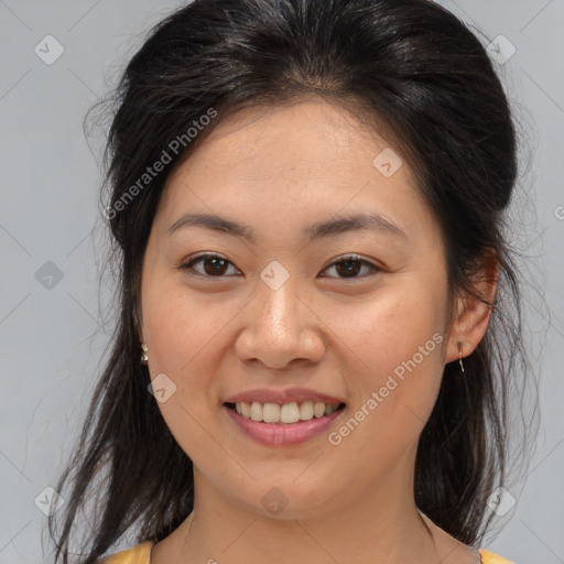 Joyful white young-adult female with medium  brown hair and brown eyes