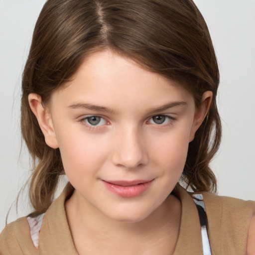 Joyful white child female with medium  brown hair and brown eyes