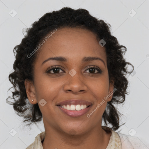 Joyful black young-adult female with medium  brown hair and brown eyes