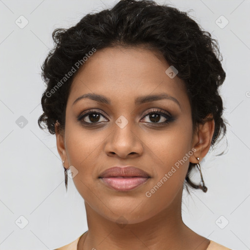 Joyful latino young-adult female with short  brown hair and brown eyes