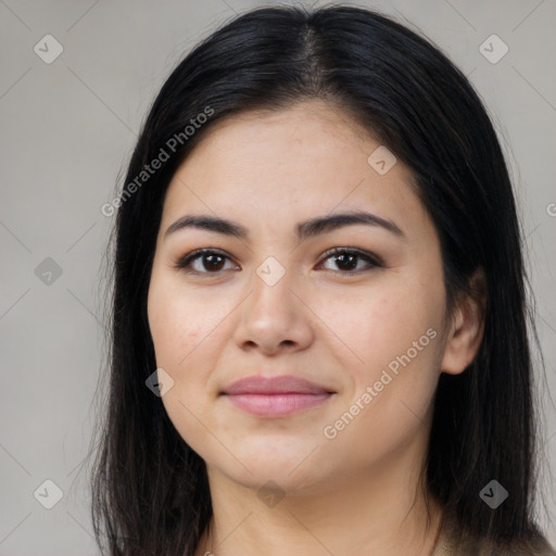 Joyful asian young-adult female with long  black hair and brown eyes