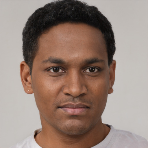 Neutral black young-adult male with short  black hair and brown eyes