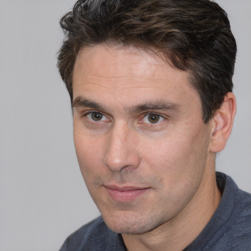 Neutral white adult male with short  brown hair and brown eyes