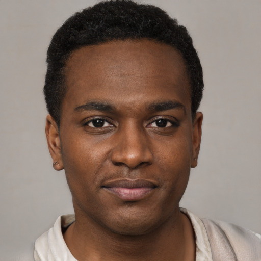 Neutral black young-adult male with short  brown hair and brown eyes