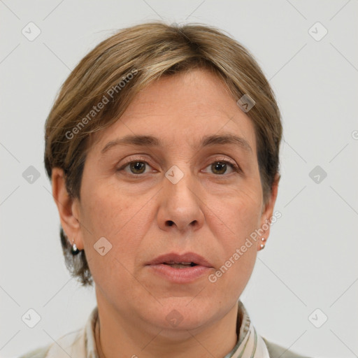 Joyful white adult female with short  brown hair and grey eyes