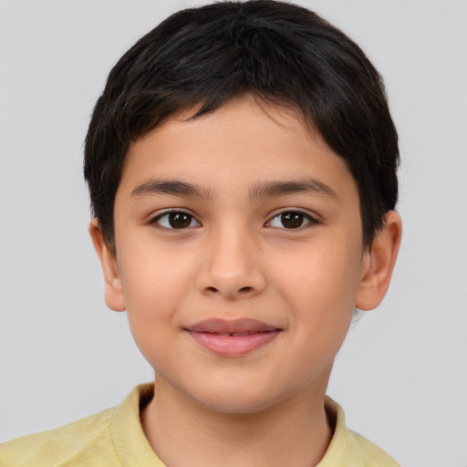 Joyful asian child female with short  brown hair and brown eyes
