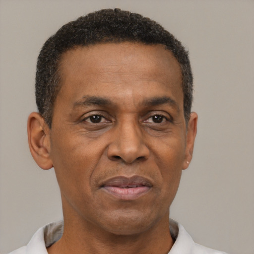 Neutral latino adult male with short  brown hair and brown eyes