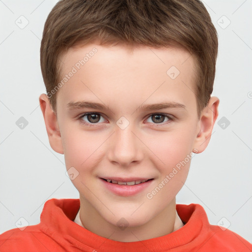 Joyful white child male with short  brown hair and brown eyes