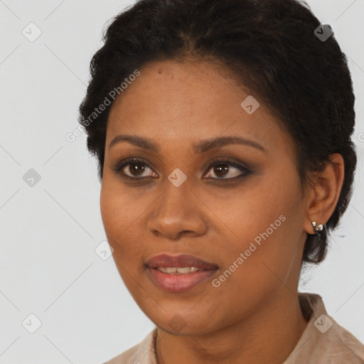 Joyful black young-adult female with short  brown hair and brown eyes