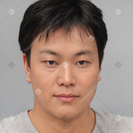 Neutral asian young-adult male with short  brown hair and brown eyes