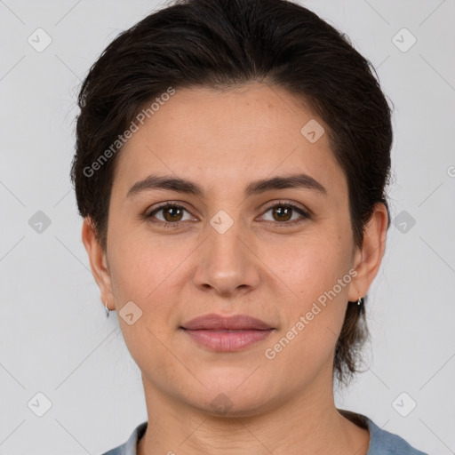 Joyful white adult female with medium  brown hair and brown eyes