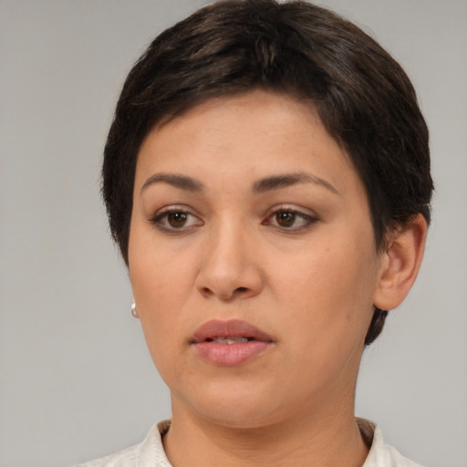Neutral white young-adult female with short  brown hair and brown eyes