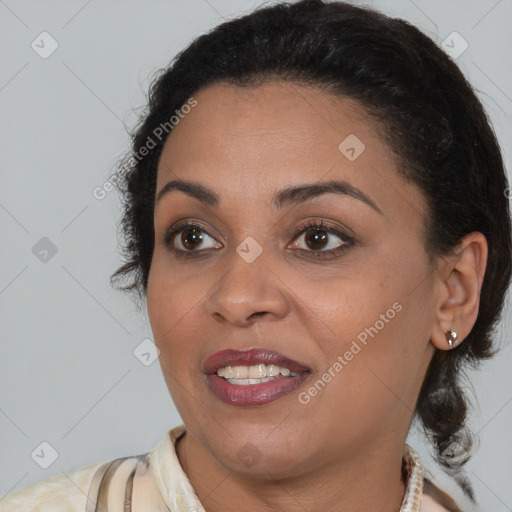 Joyful latino young-adult female with medium  brown hair and brown eyes