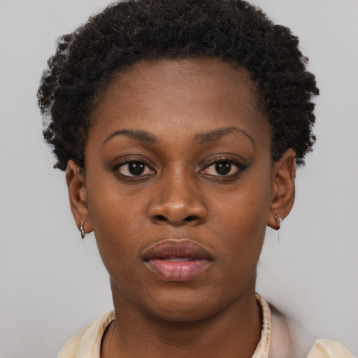 Neutral black young-adult female with short  brown hair and brown eyes