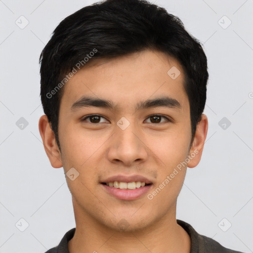 Joyful asian young-adult male with short  brown hair and brown eyes