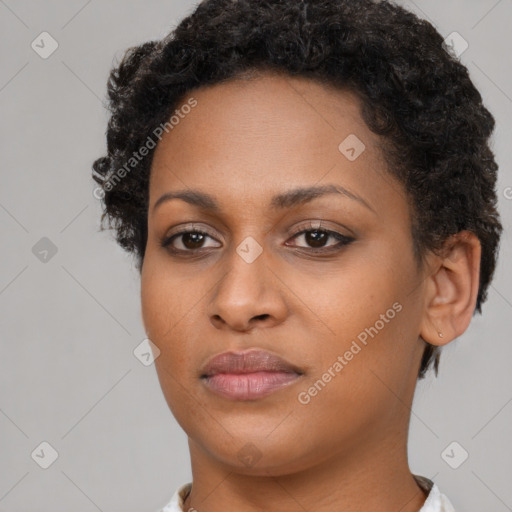 Neutral black young-adult female with short  brown hair and brown eyes