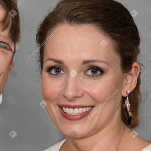 Joyful white young-adult female with medium  brown hair and blue eyes