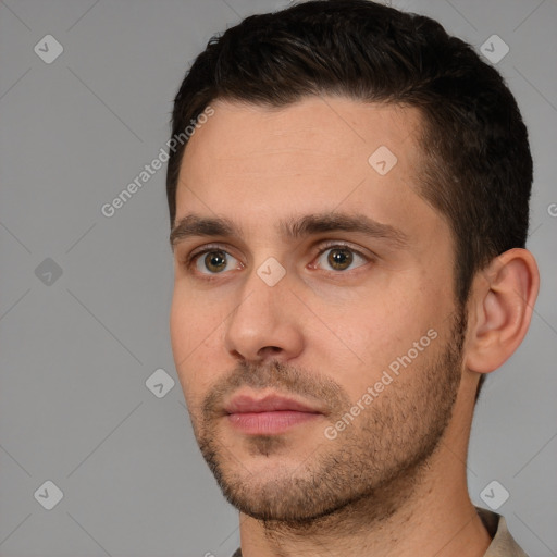 Neutral white young-adult male with short  brown hair and brown eyes