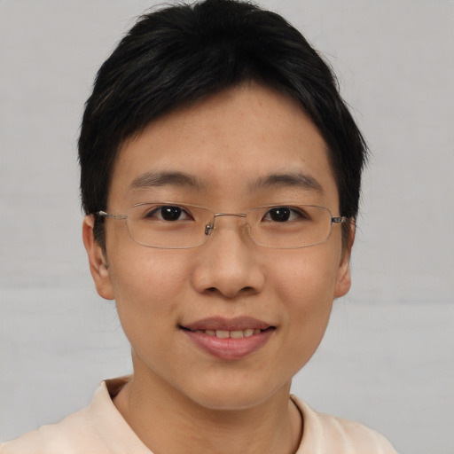 Joyful asian adult female with short  brown hair and brown eyes