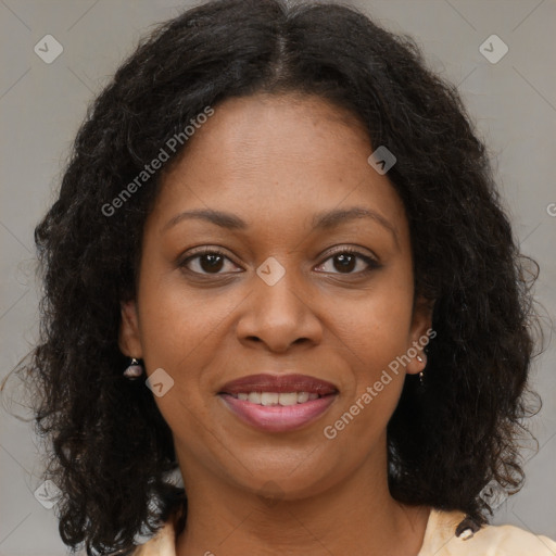 Joyful black young-adult female with medium  brown hair and brown eyes