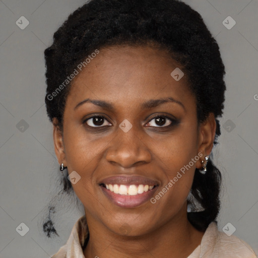 Joyful black young-adult female with short  black hair and brown eyes