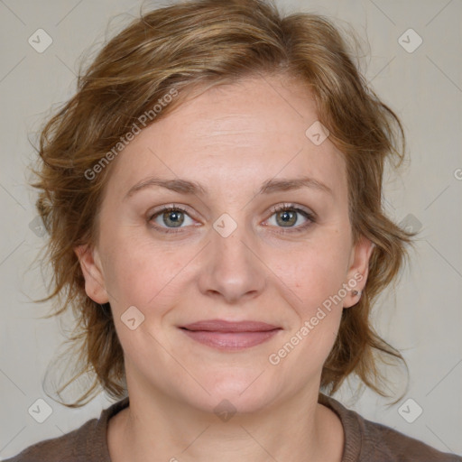 Joyful white young-adult female with medium  brown hair and blue eyes