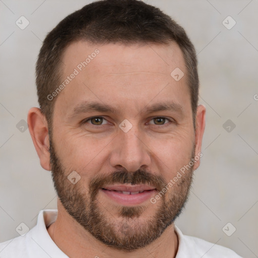 Joyful white adult male with short  brown hair and brown eyes