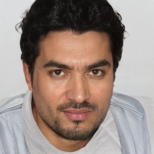 Neutral white young-adult male with short  black hair and brown eyes