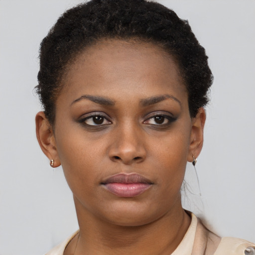 Neutral black young-adult female with short  brown hair and brown eyes