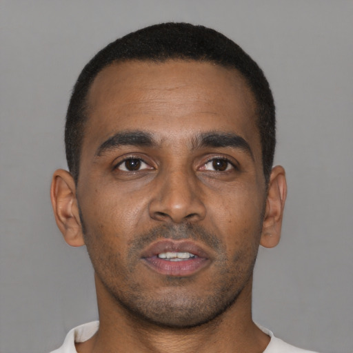 Neutral black young-adult male with short  brown hair and brown eyes