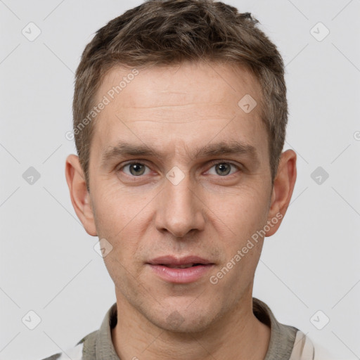 Neutral white young-adult male with short  brown hair and grey eyes