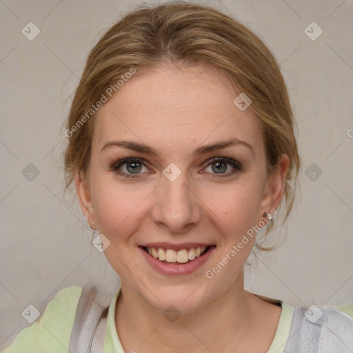 Joyful white young-adult female with medium  brown hair and blue eyes