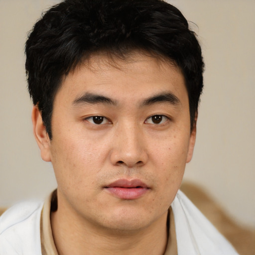 Neutral asian young-adult male with short  brown hair and brown eyes