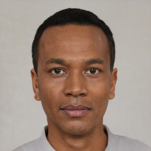 Neutral black young-adult male with short  black hair and brown eyes