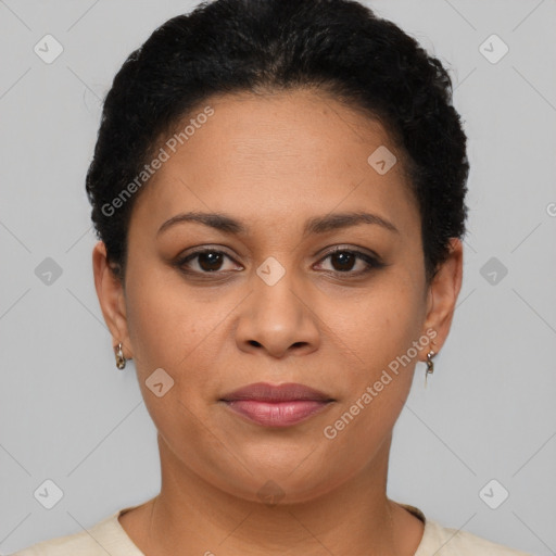 Joyful latino young-adult female with short  brown hair and brown eyes
