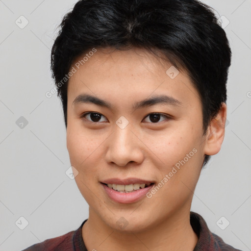 Joyful asian young-adult female with short  brown hair and brown eyes